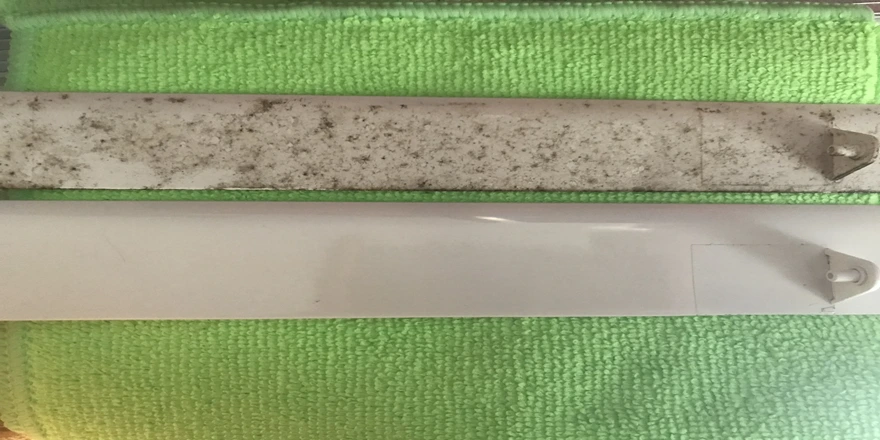 FreshAs Aircon Cleaning technician puts back clean aircon filters